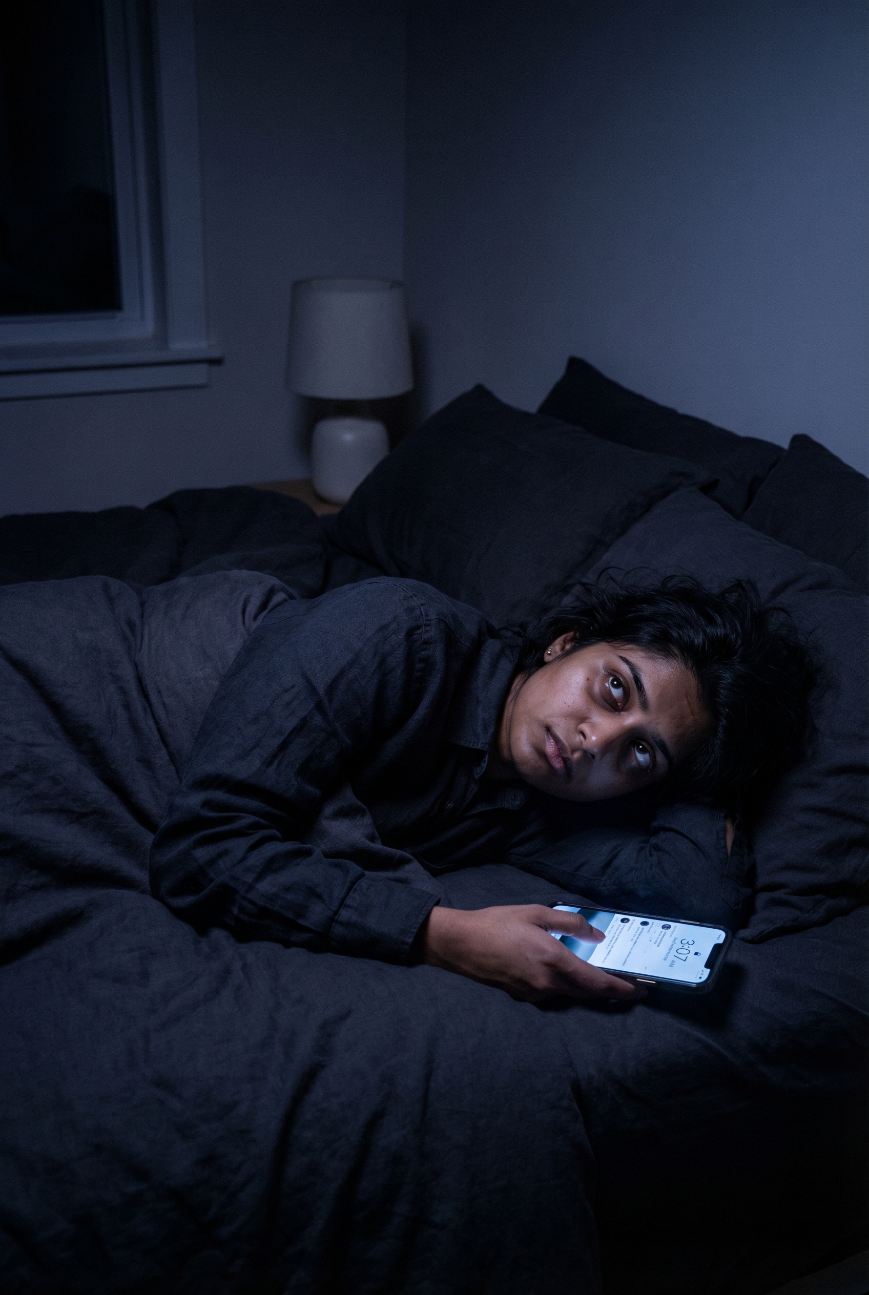 Person unable to sleep despite exhaustion